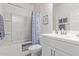 Bathroom featuring a shower/tub combo and a white vanity at 17796 W Sandy Rd, Goodyear, AZ 85338