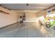 Spacious two car garage with epoxy floors featuring plenty of room for bikes and storage at 17796 W Sandy Rd, Goodyear, AZ 85338