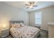 Bedroom featuring neutral paint, carpet flooring, and a bed at 18385 W Devonshire Ave, Goodyear, AZ 85395