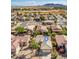 Stunning aerial view of a vibrant residential community with well-maintained homes and mountain views at 1869 E Birch St, Casa Grande, AZ 85122