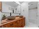 Modern bathroom with stylish vanity featuring stone vessel sinks and contemporary fixtures at 1880 E Morten Ave # 124, Phoenix, AZ 85020