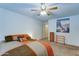 Bedroom features a ceiling fan, carpeted floor, and warm color scheme at 2101 S Meridian Rd # 190, Apache Junction, AZ 85120