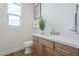 Bright bathroom features new vanity and large window at 2121 W Sonoran Desert Dr # 93, Phoenix, AZ 85085