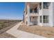 Two-story building exterior with balcony, showcasing modern design and landscaping at 2121 W Sonoran Desert Dr # 93, Phoenix, AZ 85085