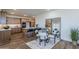Spacious kitchen with stainless steel appliances, breakfast bar, and adjacent dining area at 2121 W Sonoran Desert Dr # 93, Phoenix, AZ 85085