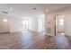 Expansive living room with hardwood floors and natural light showcases a modern, open design, creating a welcoming atmosphere at 2121 W Sonoran Desert Dr # 93, Phoenix, AZ 85085