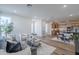 Bright living room with open floor plan featuring hardwood floors and comfortable furnishings at 2121 W Sonoran Desert Dr # 93, Phoenix, AZ 85085