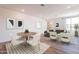 Elegant living room featuring modern decor, stylish furnishings, and natural light from a large window at 2121 W Sonoran Desert Dr # 93, Phoenix, AZ 85085