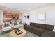 Inviting living room with a comfortable sofa, stylish chairs, and an open concept to the kitchen at 2121 W Sonoran Desert Dr # 93, Phoenix, AZ 85085