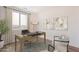 Bright home office with large window, modern desk, and comfortable seating, perfect for productivity at 2121 W Sonoran Desert Dr # 93, Phoenix, AZ 85085
