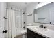 Bright bathroom featuring a shower and tub combo, modern vanity, and updated fixtures at 2217 E Sheridan St, Phoenix, AZ 85006