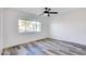 Bright bedroom with laminate wood flooring, and white walls at 2217 E Sheridan St, Phoenix, AZ 85006