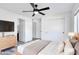 Bright bedroom with a ceiling fan, hard flooring, and a modern dresser at 2217 E Sheridan St, Phoenix, AZ 85006
