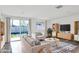 Inviting living room with sliding glass doors, comfortable seating, and modern decor at 2217 E Sheridan St, Phoenix, AZ 85006