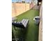 Backyard with artificial grass and patio furniture at 2605 E Geneva Dr, Tempe, AZ 85282