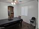 Dining room with a table, chairs, and bench. View into the kitchen at 28273 N Castle Rock Dr, San Tan Valley, AZ 85143