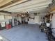 Spacious garage with epoxy floor coating and ample storage space at 28273 N Castle Rock Dr, San Tan Valley, AZ 85143