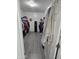 Spacious walk-in closet with ample storage, including shelves, hanging rods, and a secure safe for valuables at 28273 N Castle Rock Dr, San Tan Valley, AZ 85143