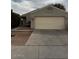 Inviting one-story home featuring a two-car garage and well-maintained front yard at 2875 W Muriel Dr, Phoenix, AZ 85053