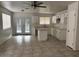 Eat in kitchen with island, white cabinets and stainless appliances at 2875 W Muriel Dr, Phoenix, AZ 85053