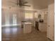 Eat in kitchen with island, white cabinets and stainless appliances at 2875 W Muriel Dr, Phoenix, AZ 85053