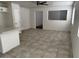 Open floor plan features white walls and tile floor at 2875 W Muriel Dr, Phoenix, AZ 85053