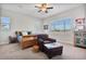 Comfortable bedroom featuring a sleigh bed, ceiling fan, and ample natural light at 2928 E Palm St, Mesa, AZ 85213