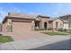 Inviting single-story home showcasing a well-manicured front yard and a classic desert landscape at 2928 E Palm St, Mesa, AZ 85213