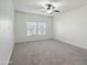 Well-lit bedroom featuring neutral paint, carpet and ceiling fan at 33575 N Dove Lakes Dr # 2028, Cave Creek, AZ 85331