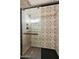 Elegant shower featuring decorative, patterned tiles and glass door, offering a modern design at 33575 N Dove Lakes Dr # 2028, Cave Creek, AZ 85331