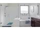 Bright bathroom features a glass shower and separate soaking tub for a relaxing experience at 3408 S 184Th Ln, Goodyear, AZ 85338