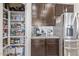 Well-organized kitchen pantry with ample shelving for storage and easy access to essentials at 3408 S 184Th Ln, Goodyear, AZ 85338