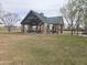 Community pavilion area with stone supports and picnic tables for residents to enjoy at 3408 S 184Th Ln, Goodyear, AZ 85338