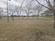 Community volleyball court with lights, grass and trees surrounding the area at 3408 S 184Th Ln, Goodyear, AZ 85338