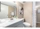 Bathroom features a modern vanity, neutral decor, and well-lit mirror at 3511 E Baseline Rd # 1076, Phoenix, AZ 85042