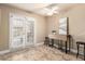 Bright dining area with French doors, a modern folding table, and neutral decor at 3511 E Baseline Rd # 1076, Phoenix, AZ 85042