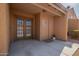 Welcoming entrance features a private front patio with double doors and a security door leading inside at 3511 E Baseline Rd # 1076, Phoenix, AZ 85042