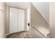 Neutral hallway with storage closet and bedroom view at 3511 E Baseline Rd # 1076, Phoenix, AZ 85042