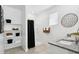 Bright, modern bathroom featuring a shower and vanity with granite countertops at 38055 W Bello Ln, Maricopa, AZ 85138