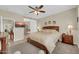 Lovely bedroom features custom lighting, a ceiling fan, and serene decor at 3931 N 163Rd Dr, Goodyear, AZ 85395