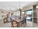 Dining room features a chandelier and sliding door leading to outdoor space at 3931 N 163Rd Dr, Goodyear, AZ 85395