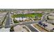 Aerial view of community park featuring a pool, playground, and green space at 4457 E Bernice St, Gilbert, AZ 85295