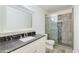 Modern bathroom with granite countertops, glass-enclosed shower, and neutral tones for a spa-like experience at 4881 S Vista Pl, Chandler, AZ 85248