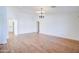 Open living room space with light hardwood flooring and natural light at 4881 S Vista Pl, Chandler, AZ 85248