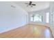 Bright living room features laminate floors, ample natural light, and a neutral color palette at 4881 S Vista Pl, Chandler, AZ 85248