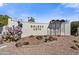 Community entrance to Golden Keys features desert landscaping, gravel, and a decorative wall at 6310 E Avalon Dr, Scottsdale, AZ 85251