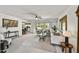 Inviting living room with comfortable seating, ceiling fan, and view to dining area at 6310 E Avalon Dr, Scottsdale, AZ 85251