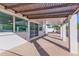 Covered back patio overlooking well-manicured yard at 6802 N 22Nd Pl, Phoenix, AZ 85016