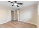 Inviting bedroom with a ceiling fan, closet, and tile flooring at 6802 N 22Nd Pl, Phoenix, AZ 85016