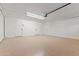 Large garage with multiple doors and clean epoxy flooring at 6802 N 22Nd Pl, Phoenix, AZ 85016